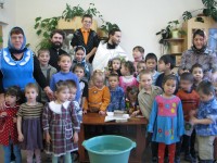 Восемнадцать воспитанников детского дома пос. Ягодный приняли Таинство Крещения